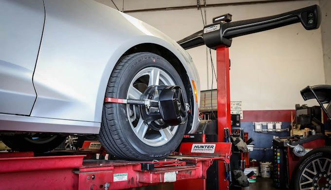 Hunter wheel alignment machine in service bay
